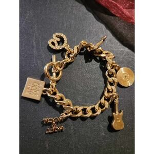 VINTAGE ST. JOHN GOLD ROCK AND ROLL CHARM BRACELET